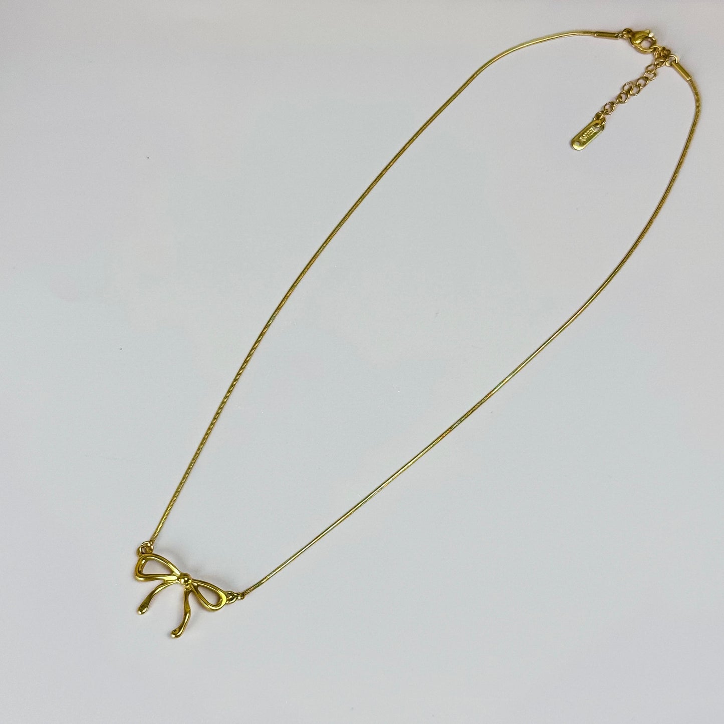 Gold Bow Pendant Necklace