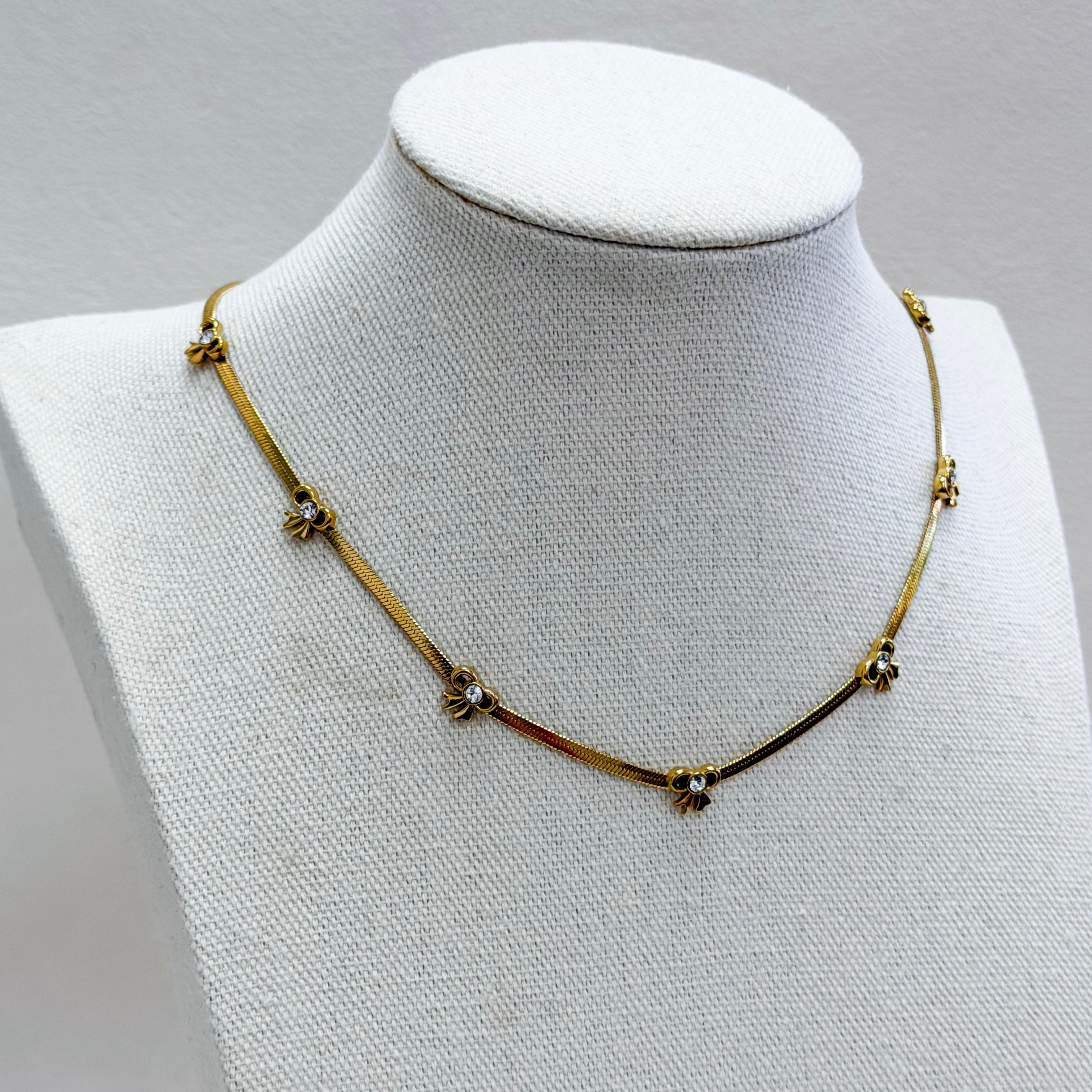 Golden Bow Charm Necklace