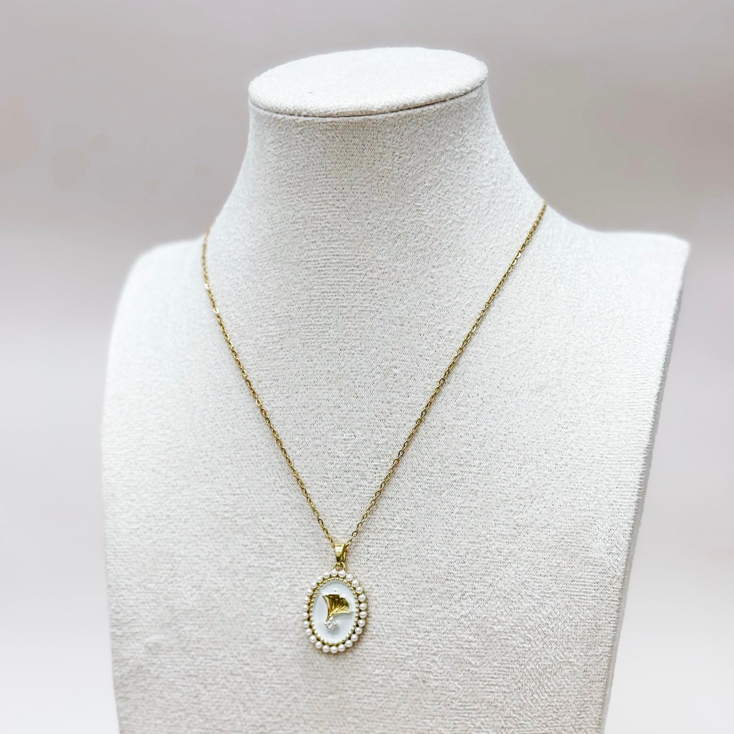 The Pearl Crest Pendant Necklace
