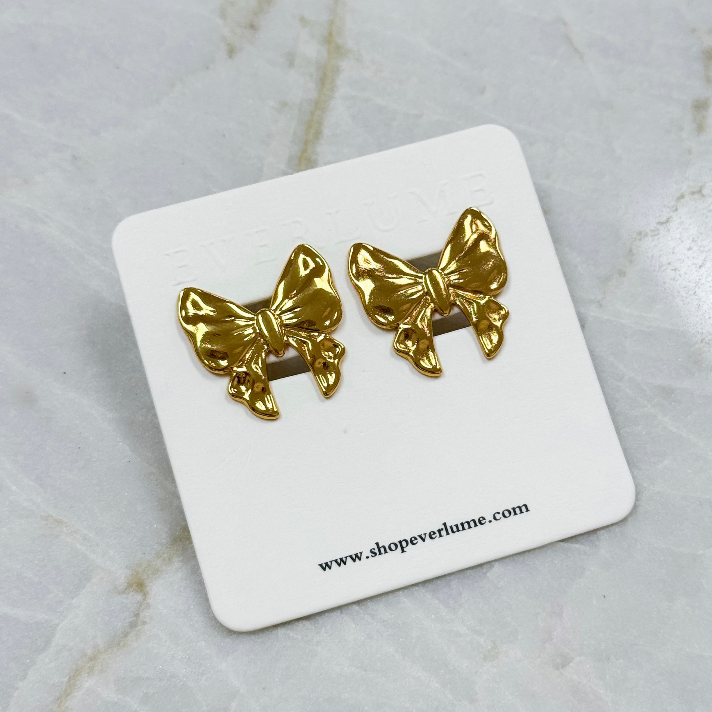 Golden Flutter Statement Studs
